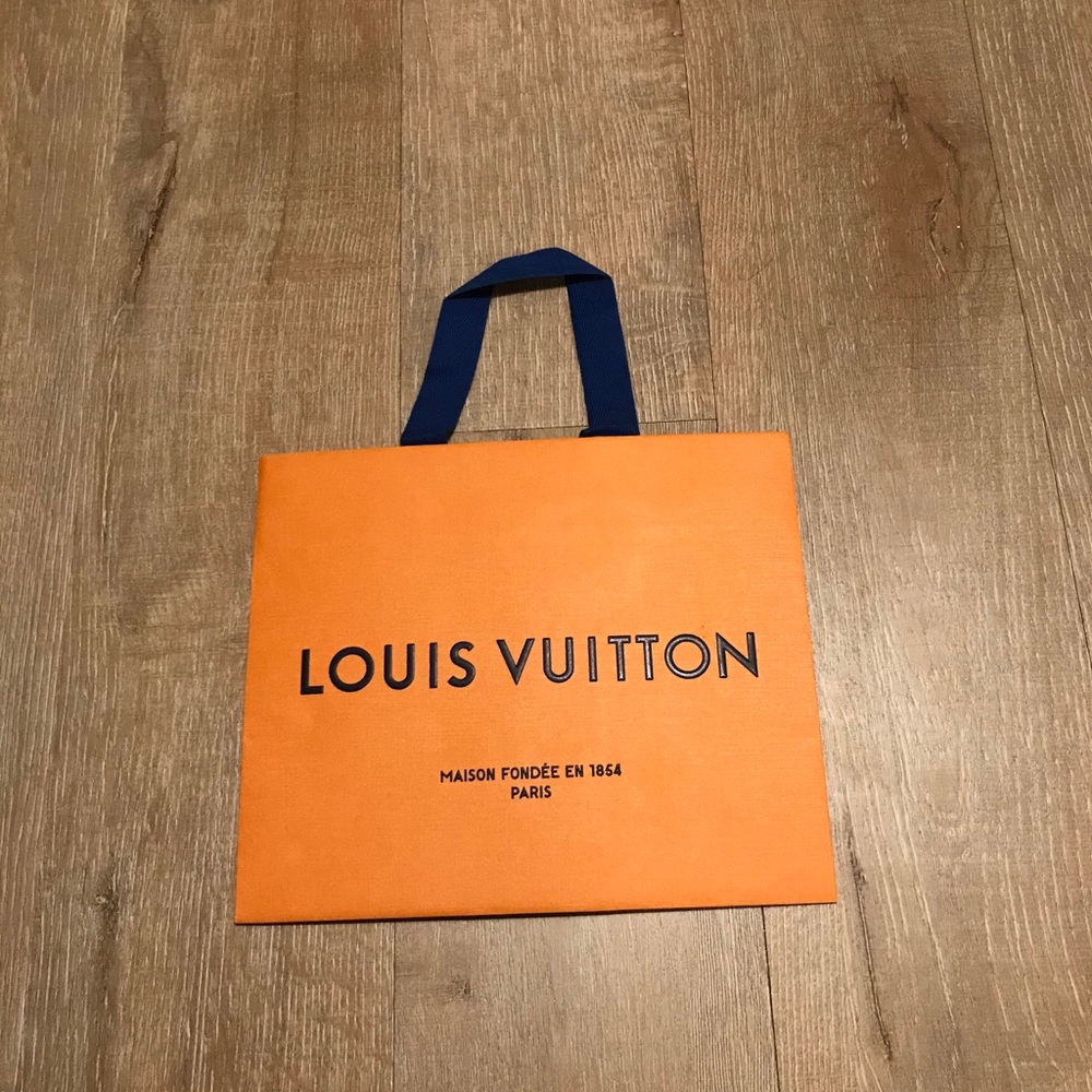 Louis Vuitton orange shopping bag 9.75”x8.25”